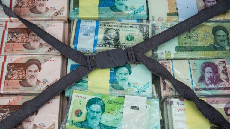 Iran faces a dual crisis amid a devaluation of its currency and the loss of a key regional ally