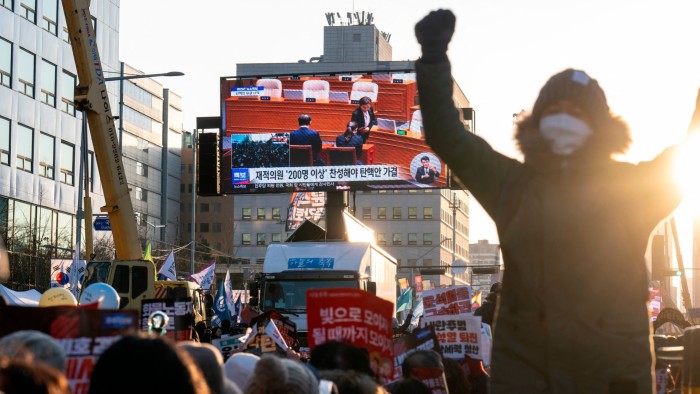 South Korea president vows to ‘never give up’ after impeachment vote