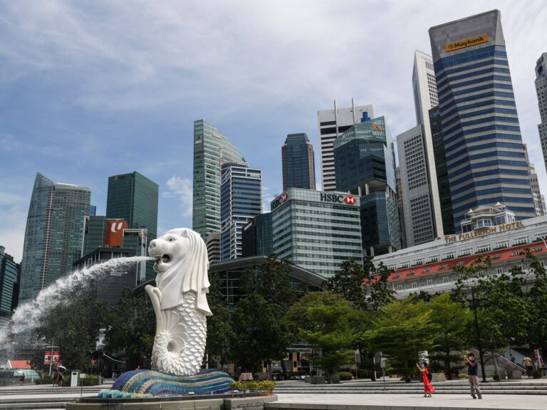 Singapore’s economy grew by 4%, beating forecasts Business and Economics