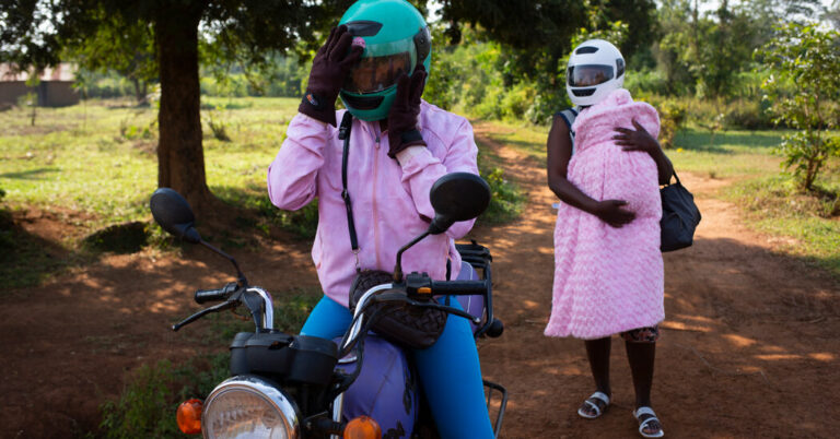 Where the taxi motorcycle and drivers are women