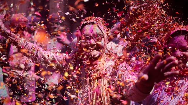 Celebrates Holi in the pictures | CBC News