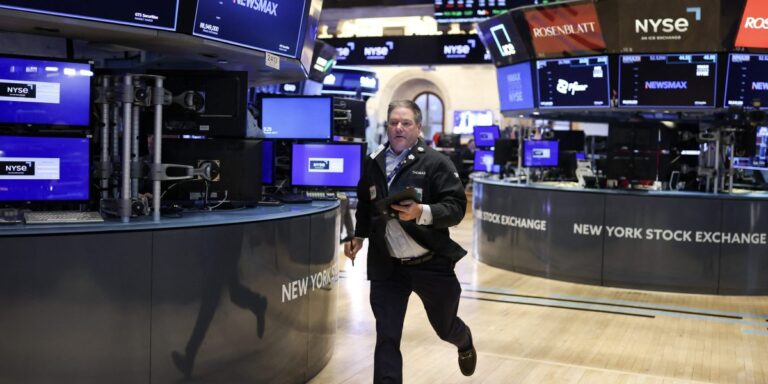 Dow crashes 2,200 points and Nasdaq falls into bear market territory as stocks extend selloff after Powell signals no imminent rate cuts