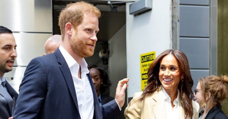 Harry and Megan share a family photo against the background of the King Charles drama